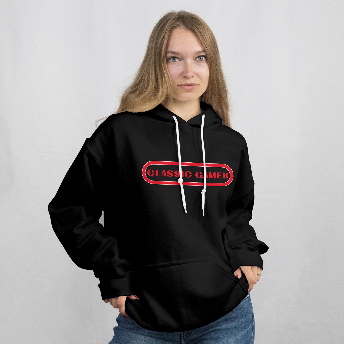 Person wearing a black hoodie with 'Classic Gamer' text on a plain background