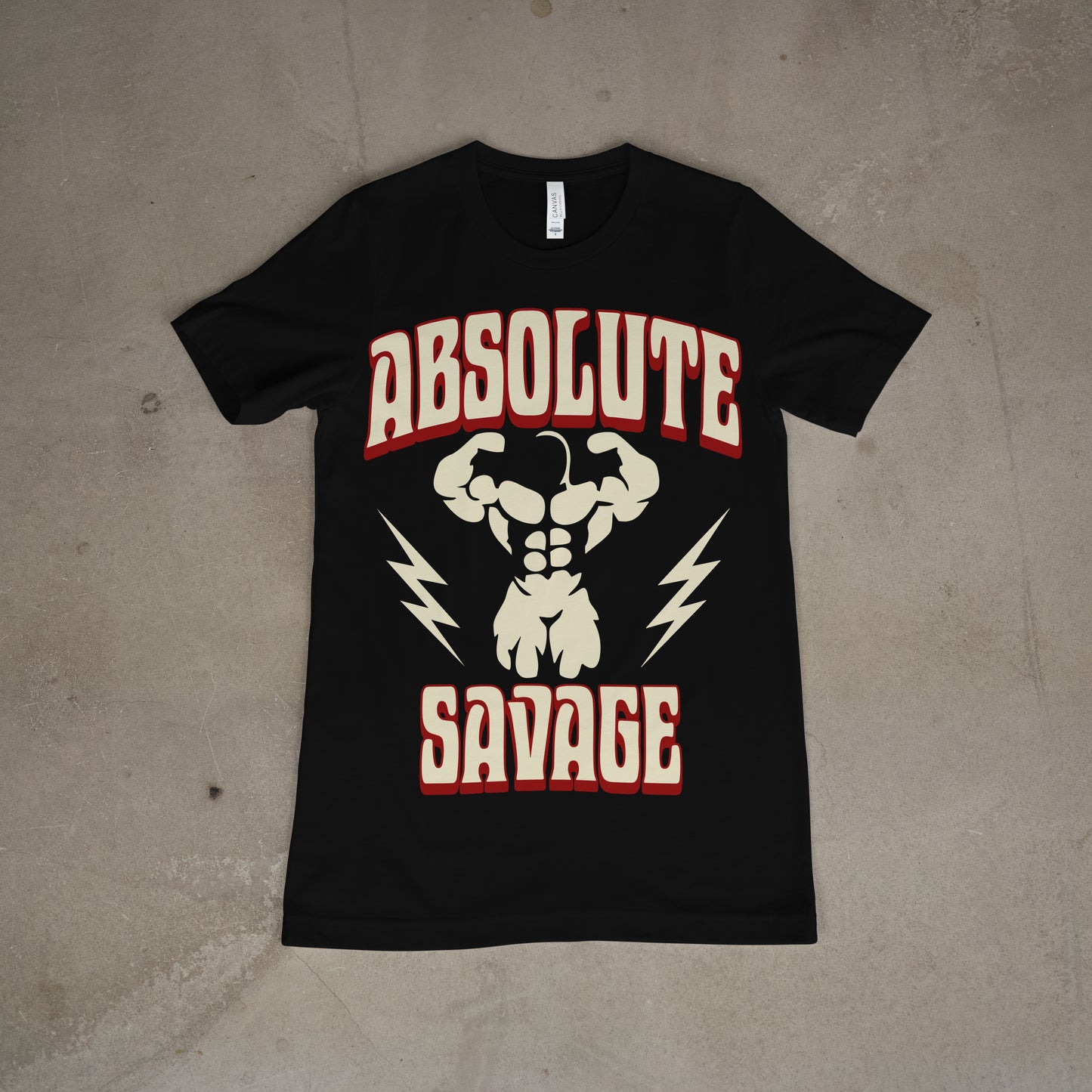 Black unisex crew neck t-shirt with the text 'Absolute Savage' printed in white, surrounded by a graphic of a flexing muscle man, with red and yellow accents.