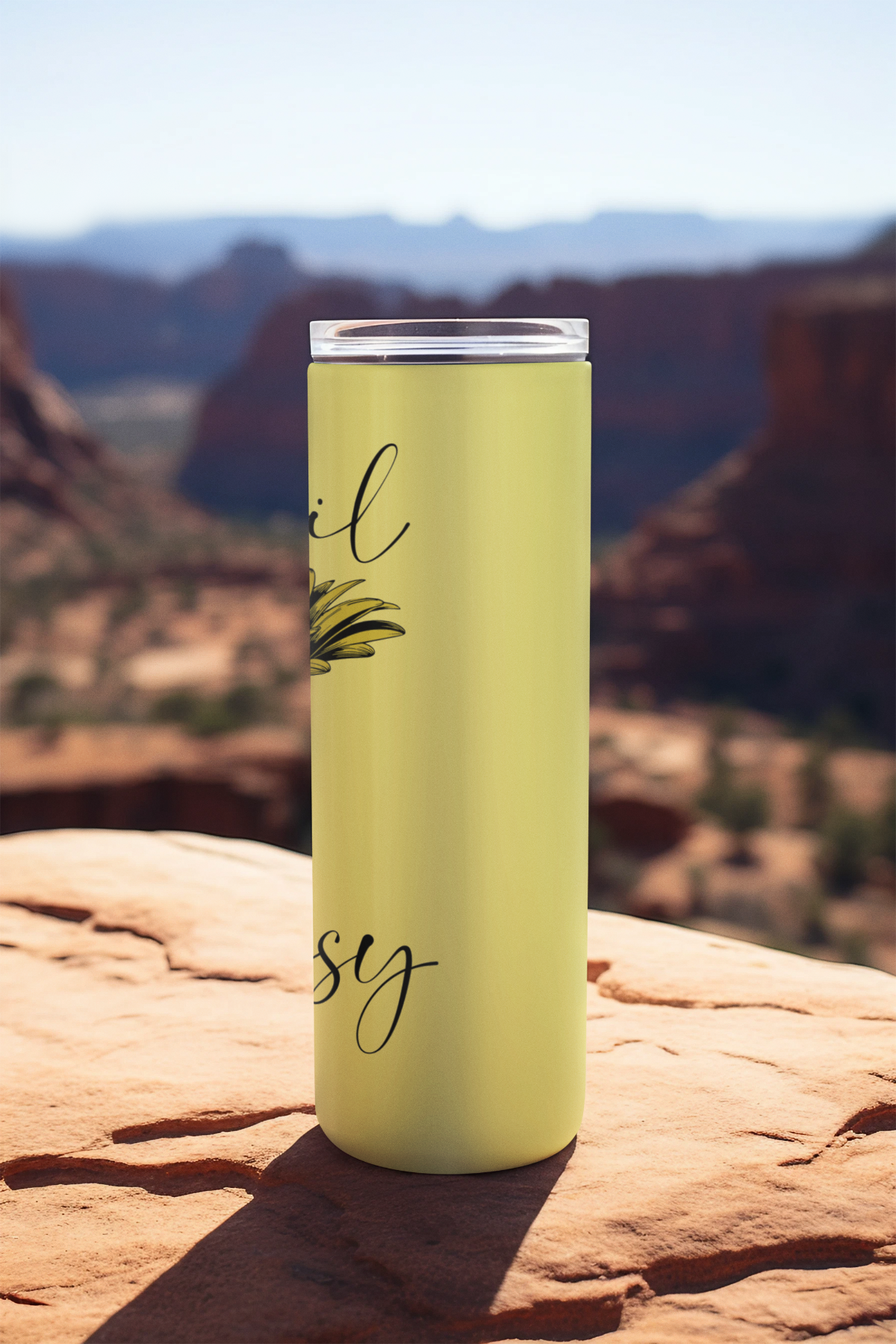 Rear view of stainless steel April tumbler outdoors