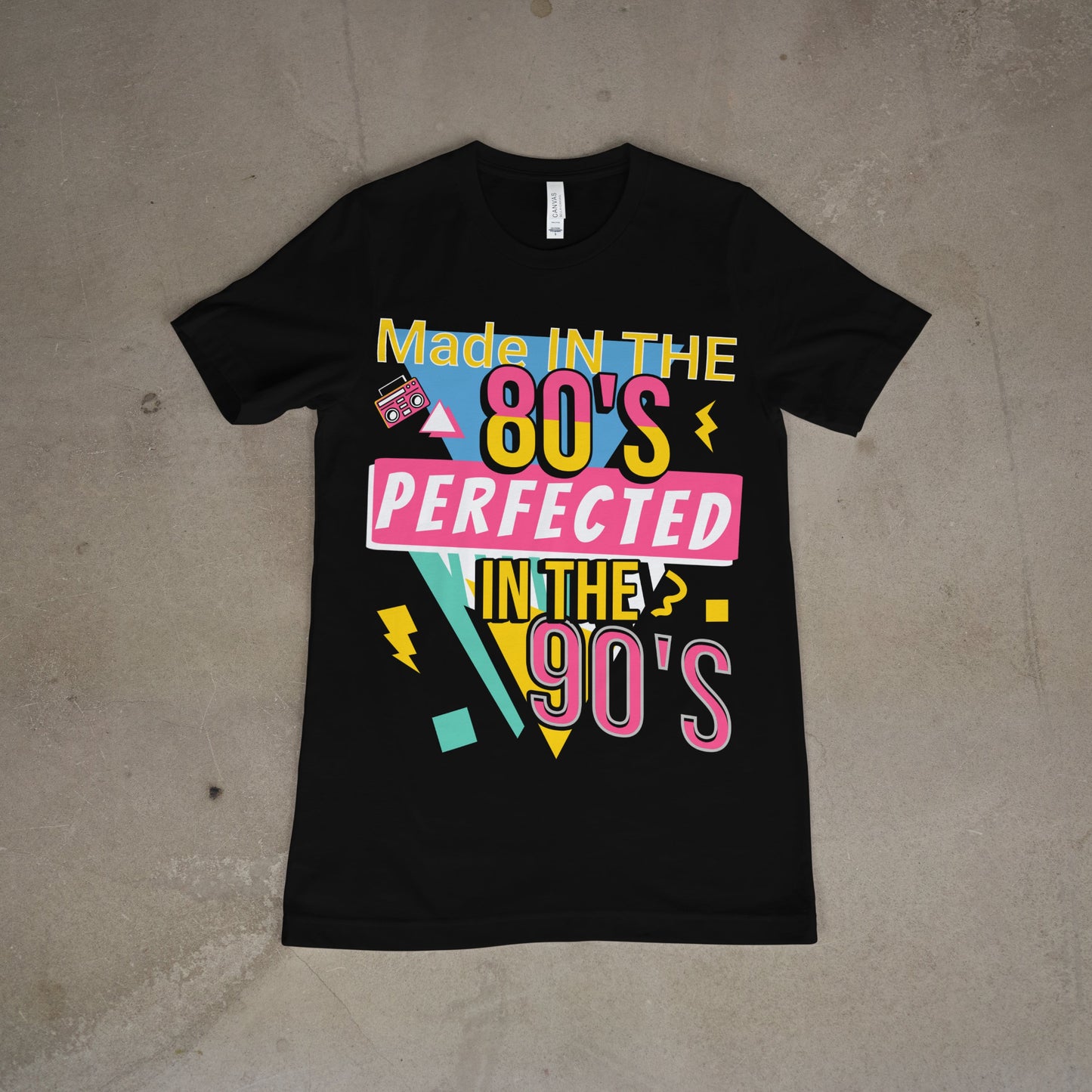 Black t-shirt with colorful retro text “Made in the 80s, Perfected in the 90s”