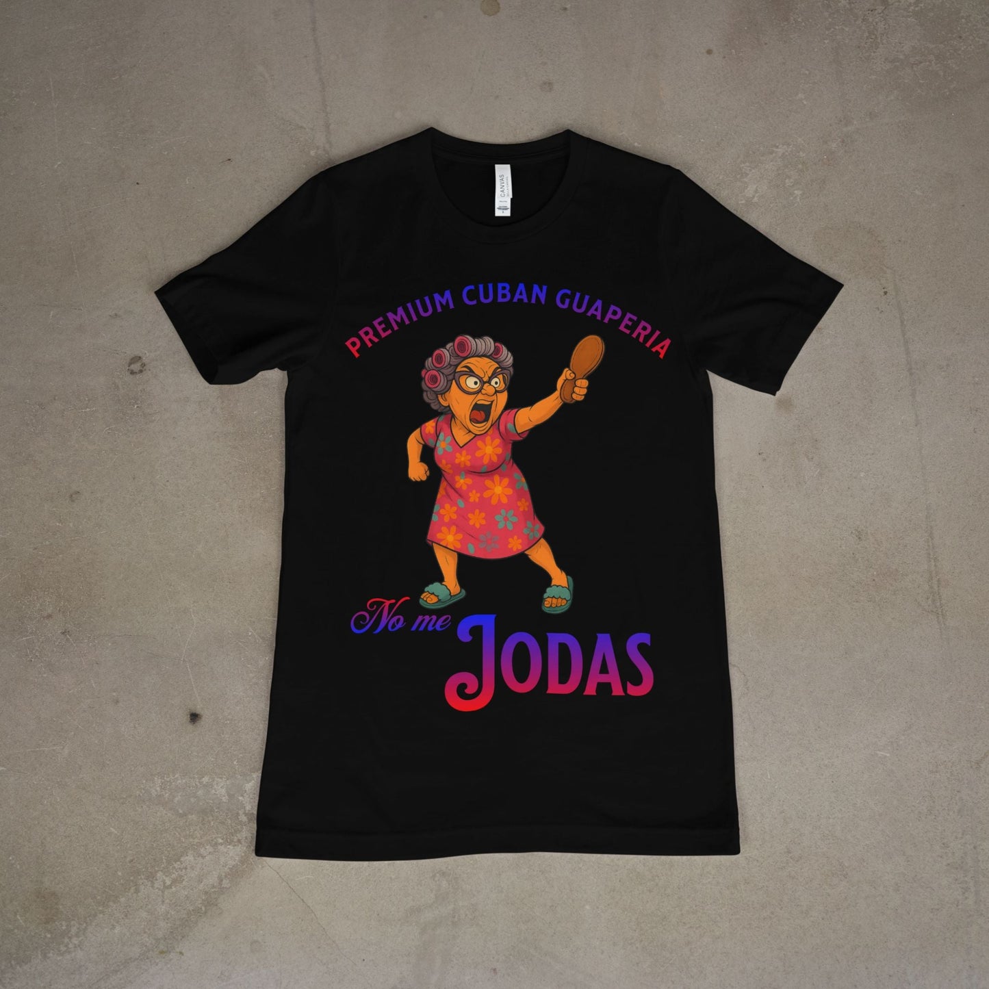 Front view of black unisex tee with “No Me Jodas” Cuban character design