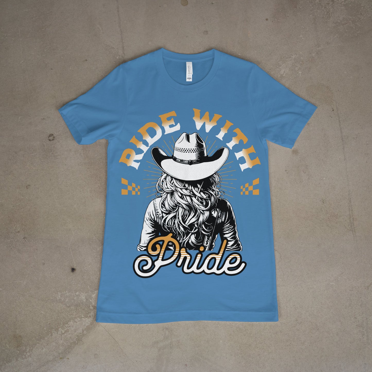 Blue “Ride with Pride” cowgirl graphic t-shirt with western font and cowboy hat artwork