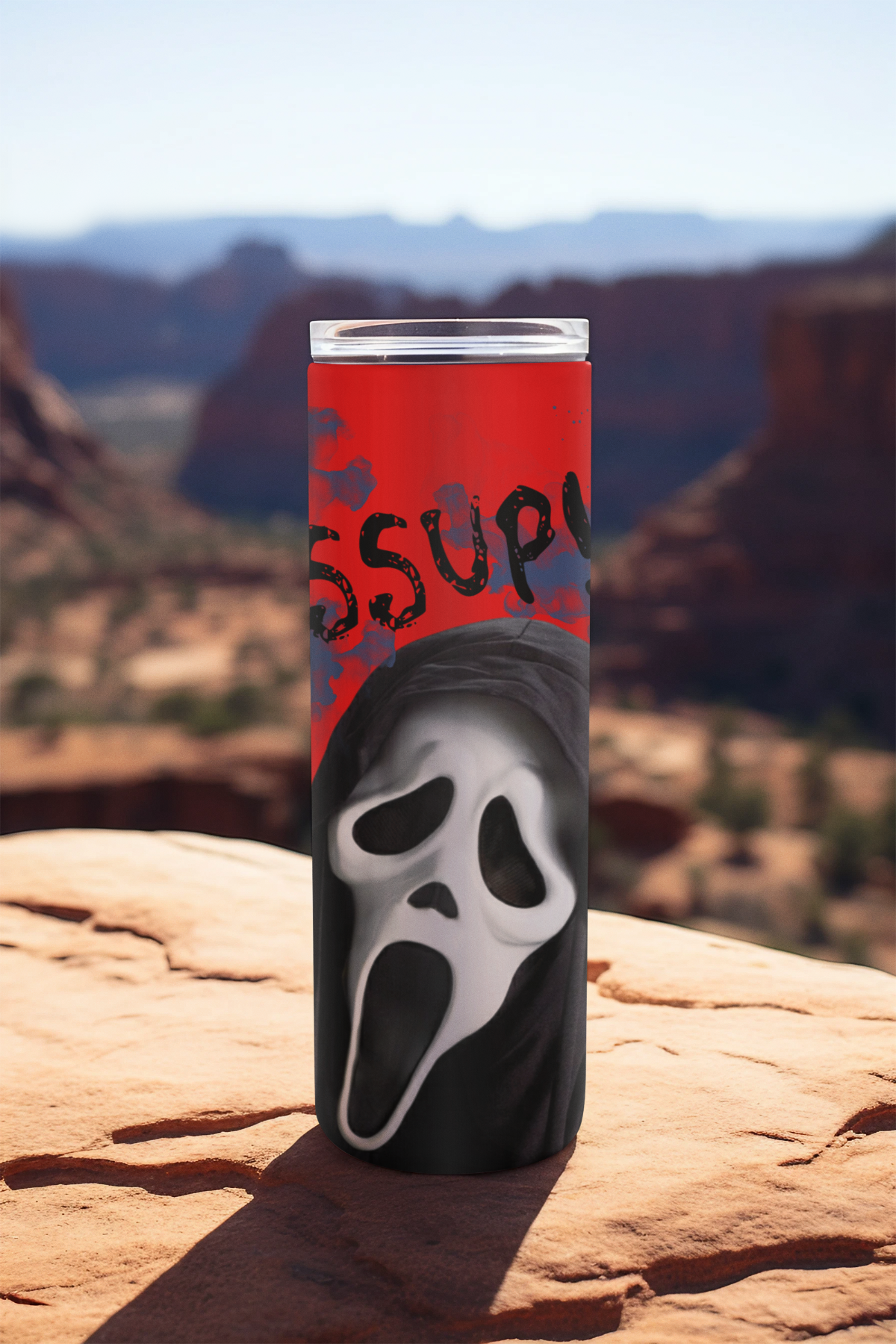 “Scary Movie parody inspired tumbler with Ghostface saying Wassup on rocky scenic background”