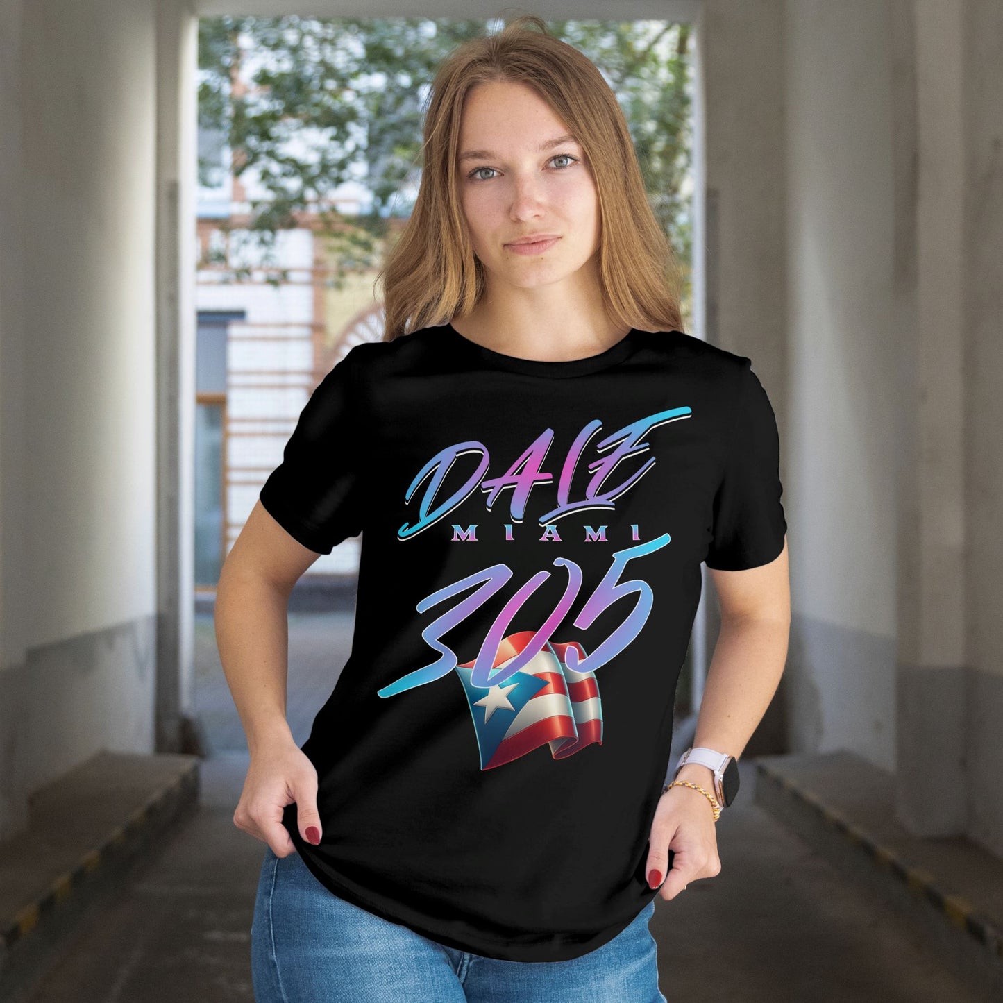 Person wearing a black t-shirt with colorful text and graphics