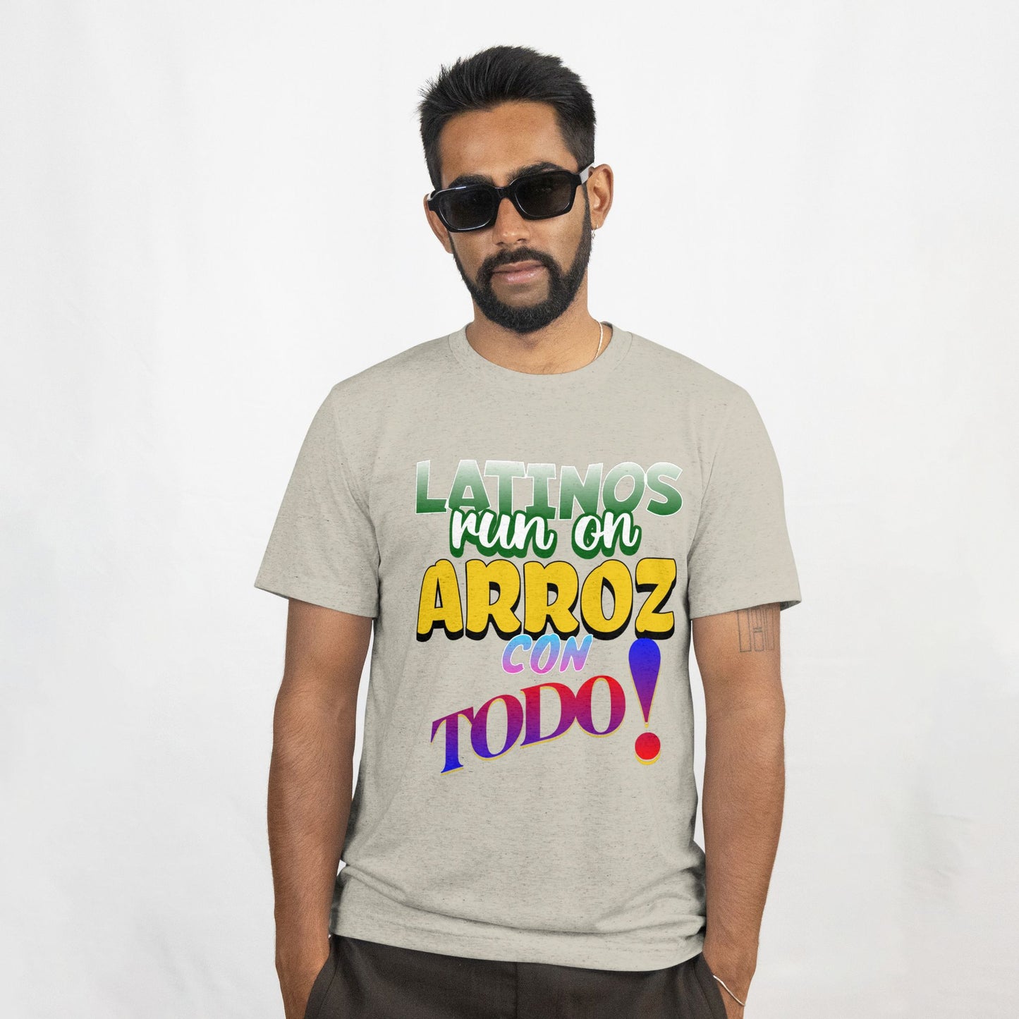 Man wearing a gray t-shirt with colorful text on a white background