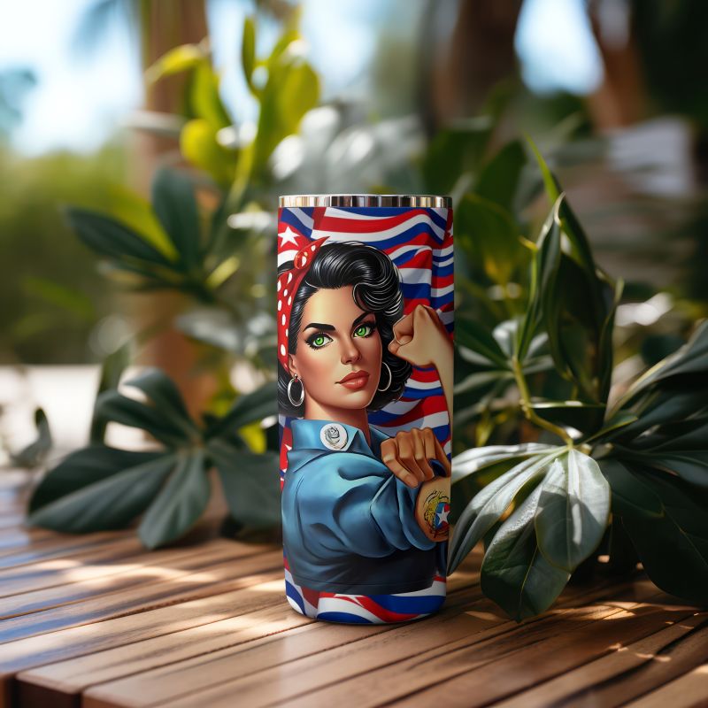 20oz stainless steel tumbler featuring a bold Cuban-style pin-up illustration of a woman in a blue shirt with a red bandana, set against a patriotic red, white, and blue background; placed on a wooden surface with green plants in the background.