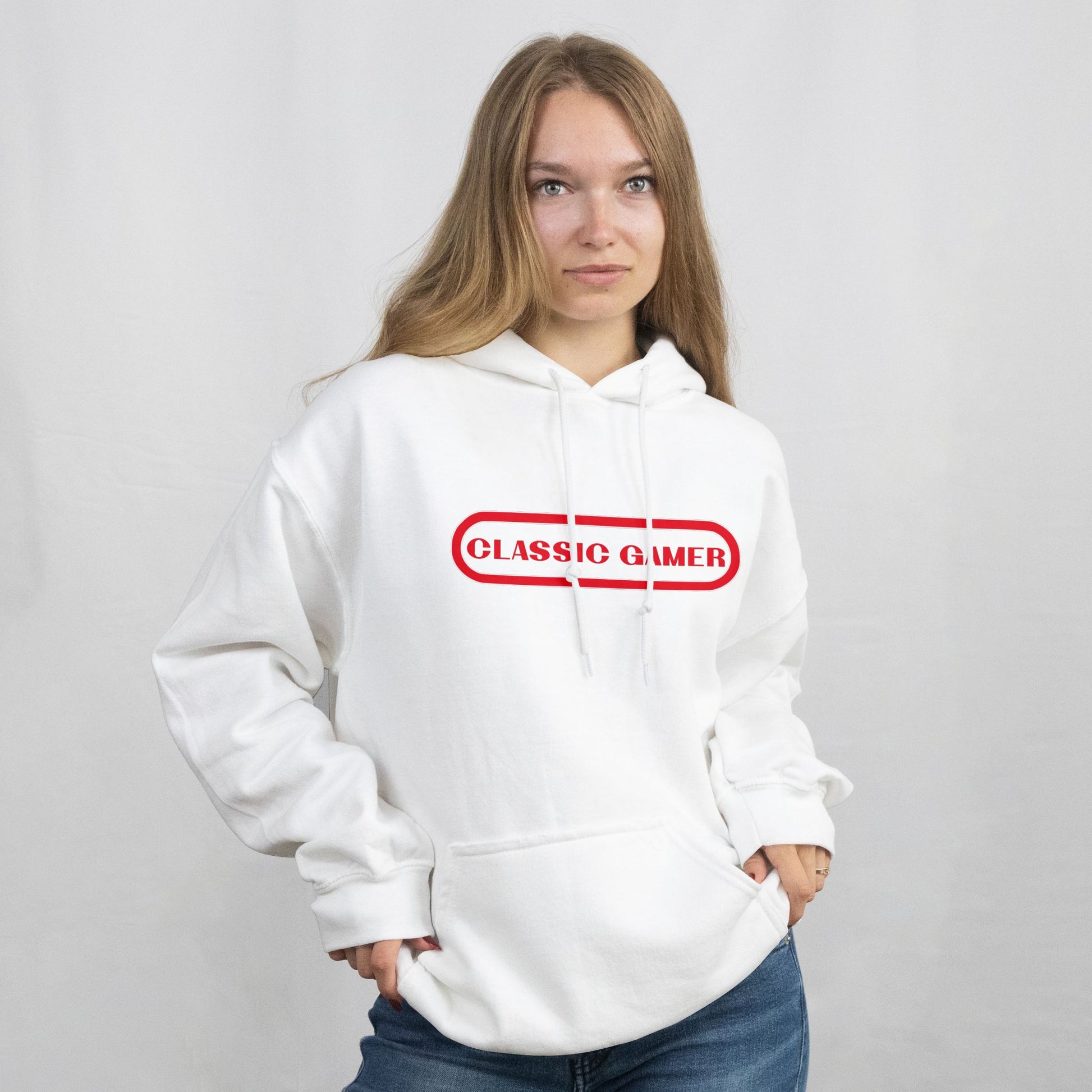 Person wearing a white hoodie with 'Classic Gamer' text on a plain background