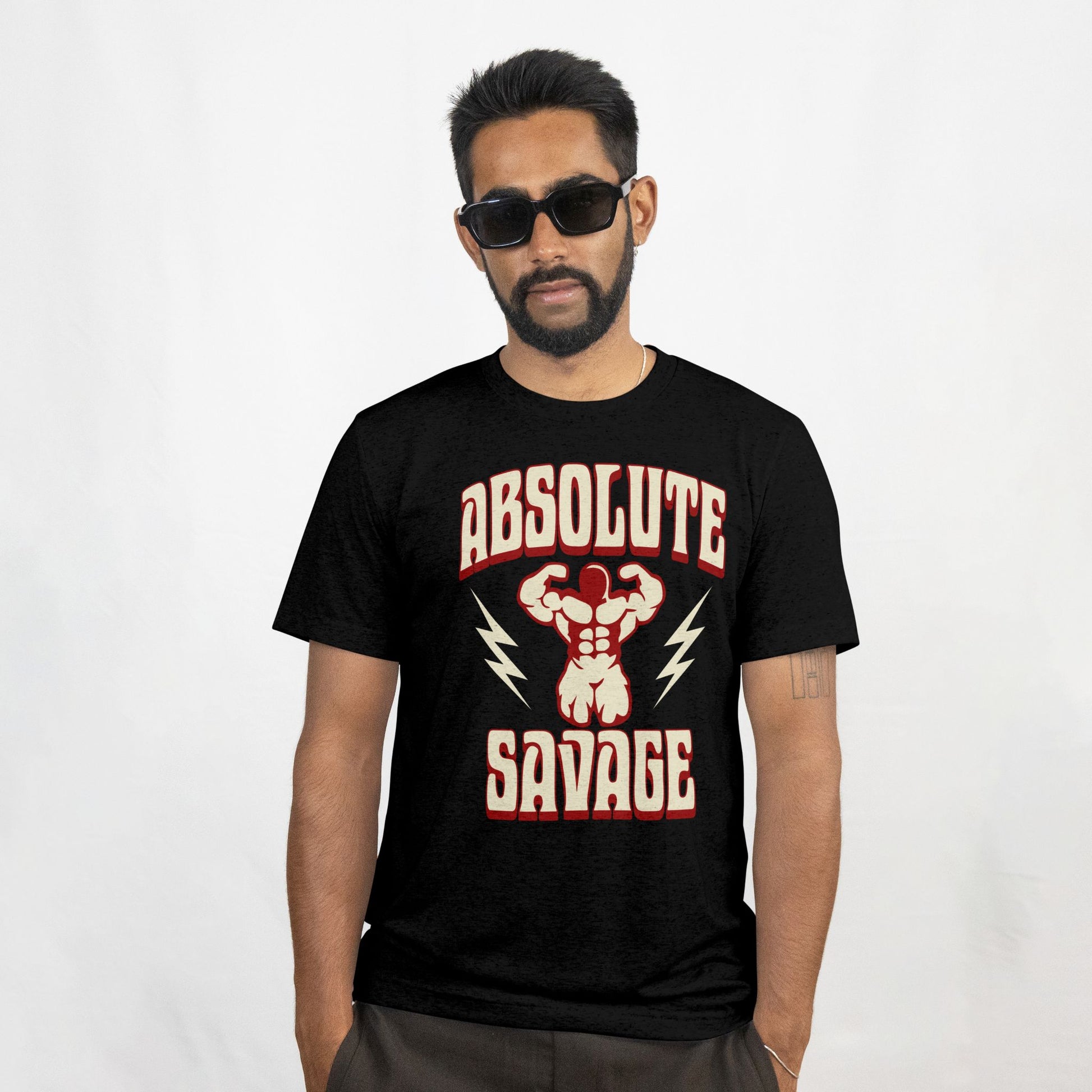 Man wearing a black t-shirt with 'Absolute Savage' graphic design on a white background
