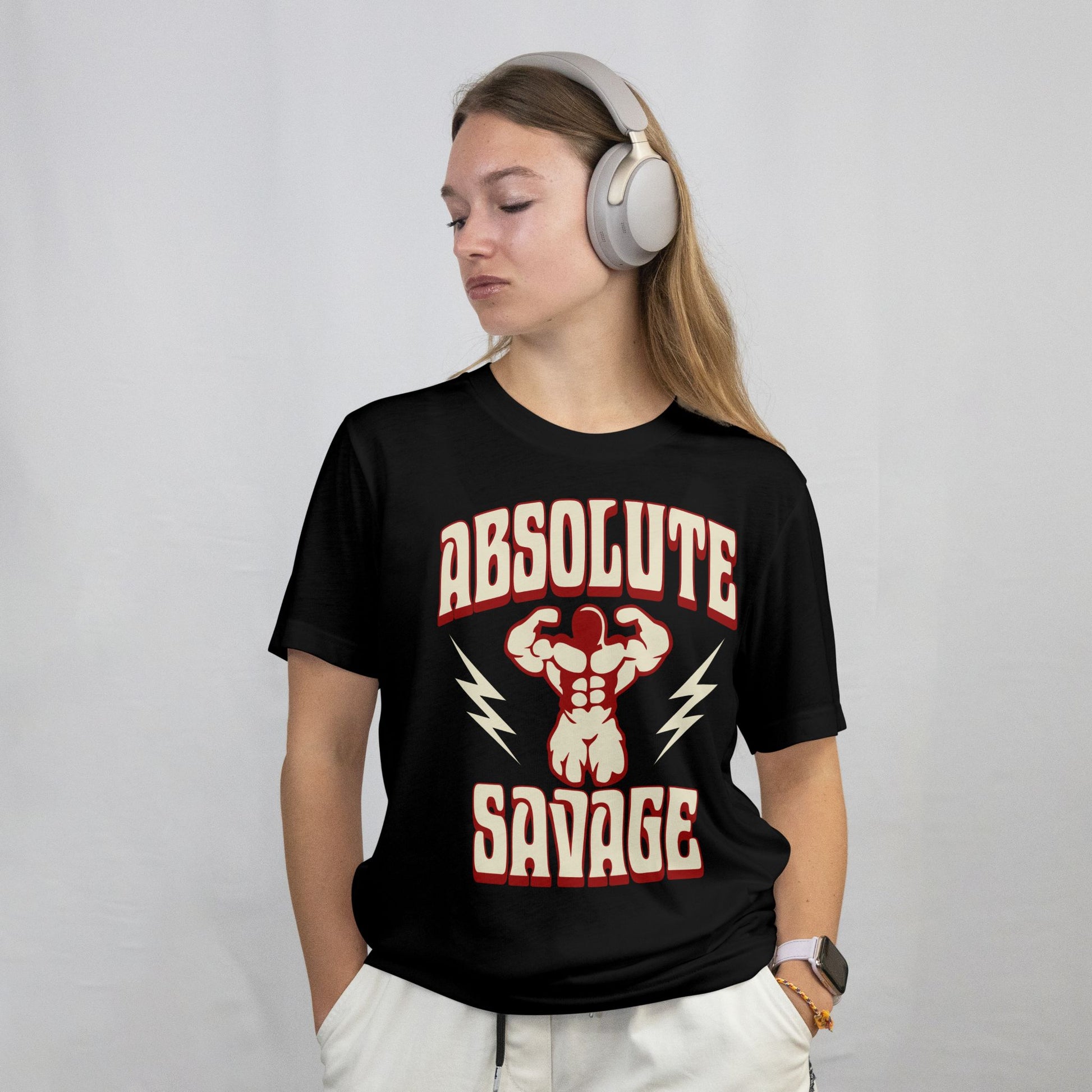 Person wearing a black t-shirt with 'Absolute Savage' graphic design on a plain background