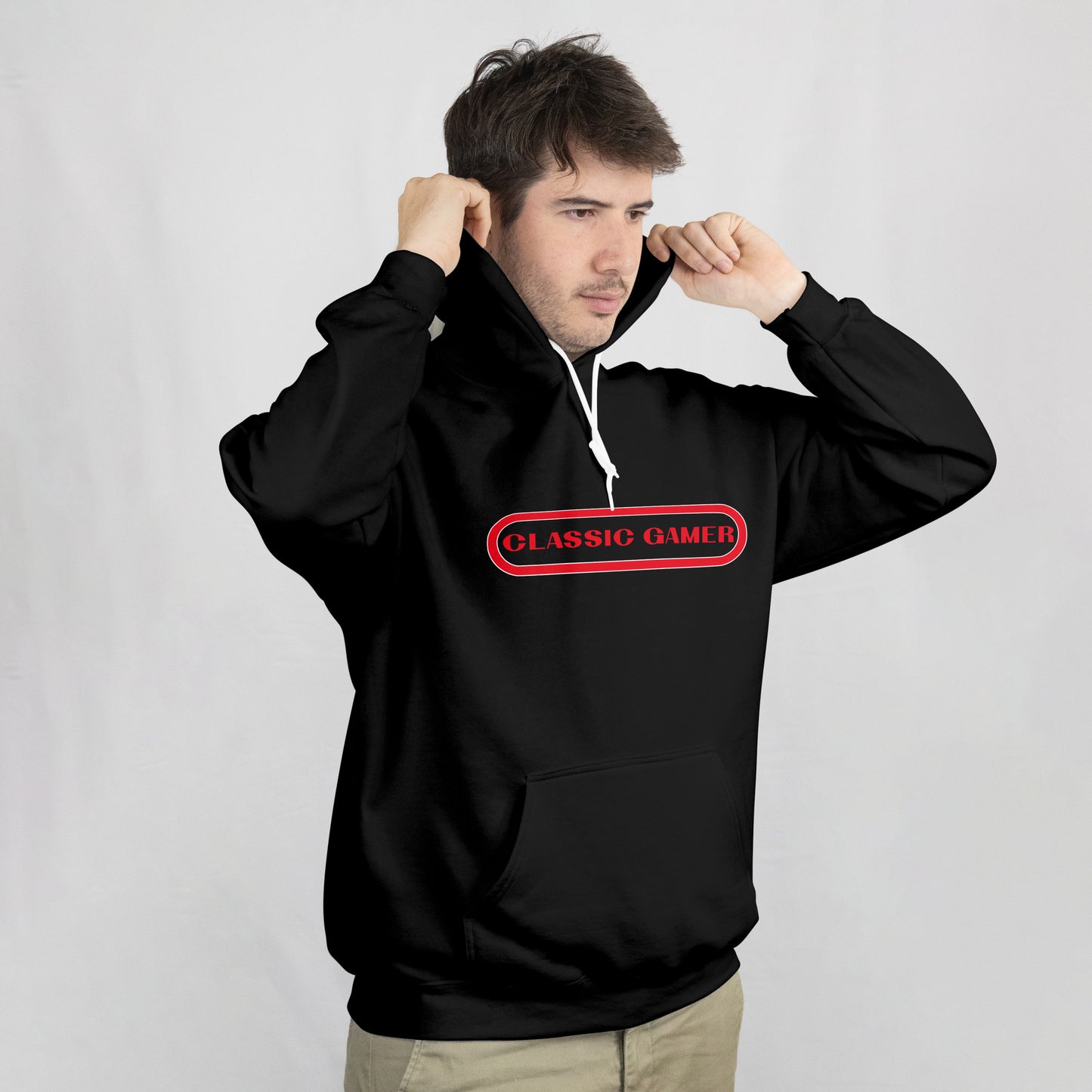Person wearing a black hoodie with a red 'Classic Gamer' logo on a light gray background