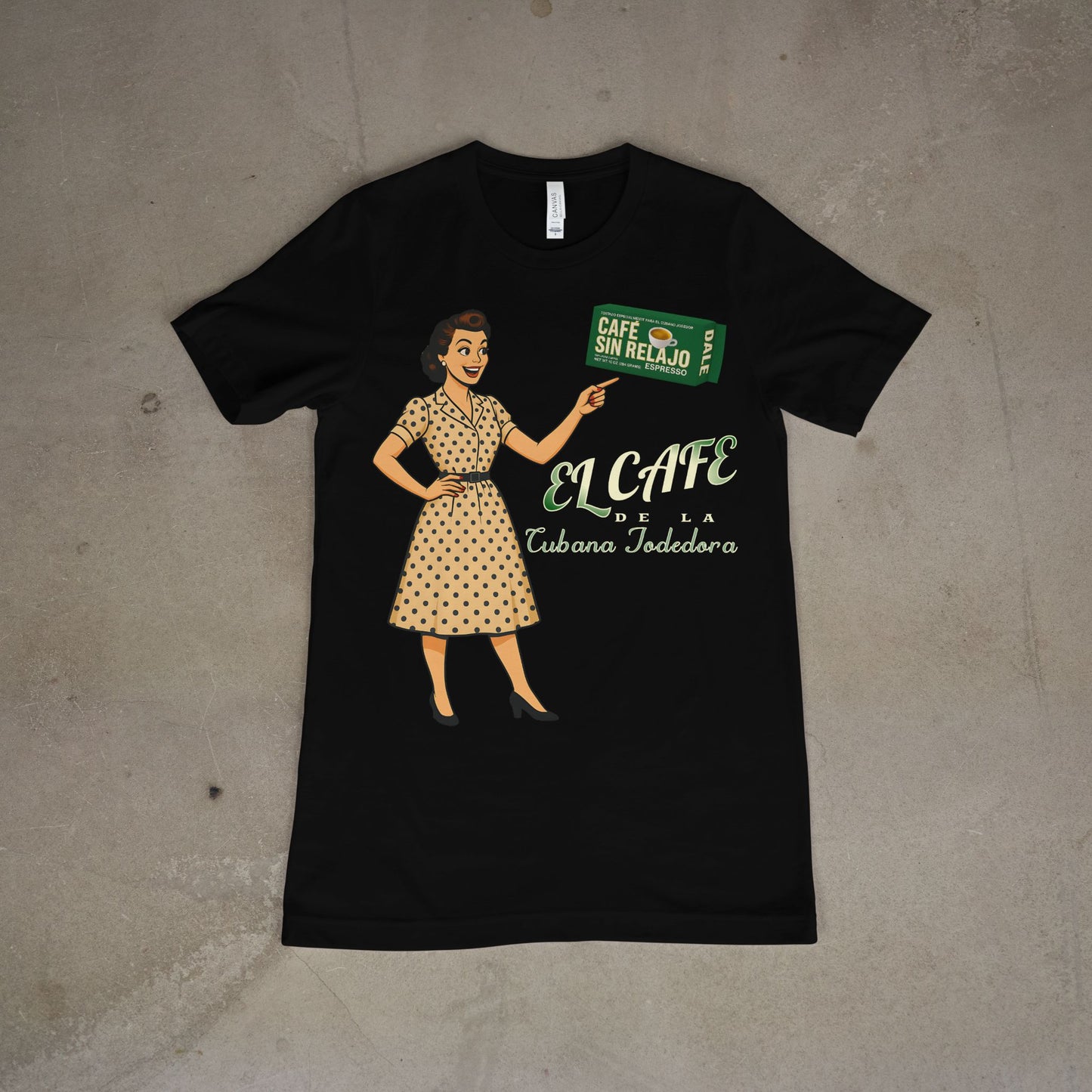 Black t-shirt with a graphic of a woman holding a coffee bag and 'El Cafe' text on a concrete floor.
