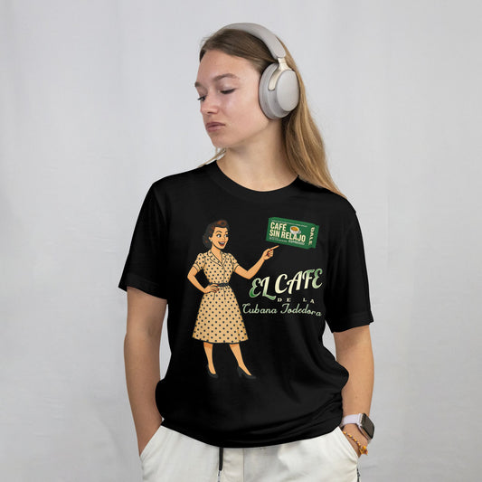 Person wearing a black t-shirt with a graphic design and headphones on a plain background