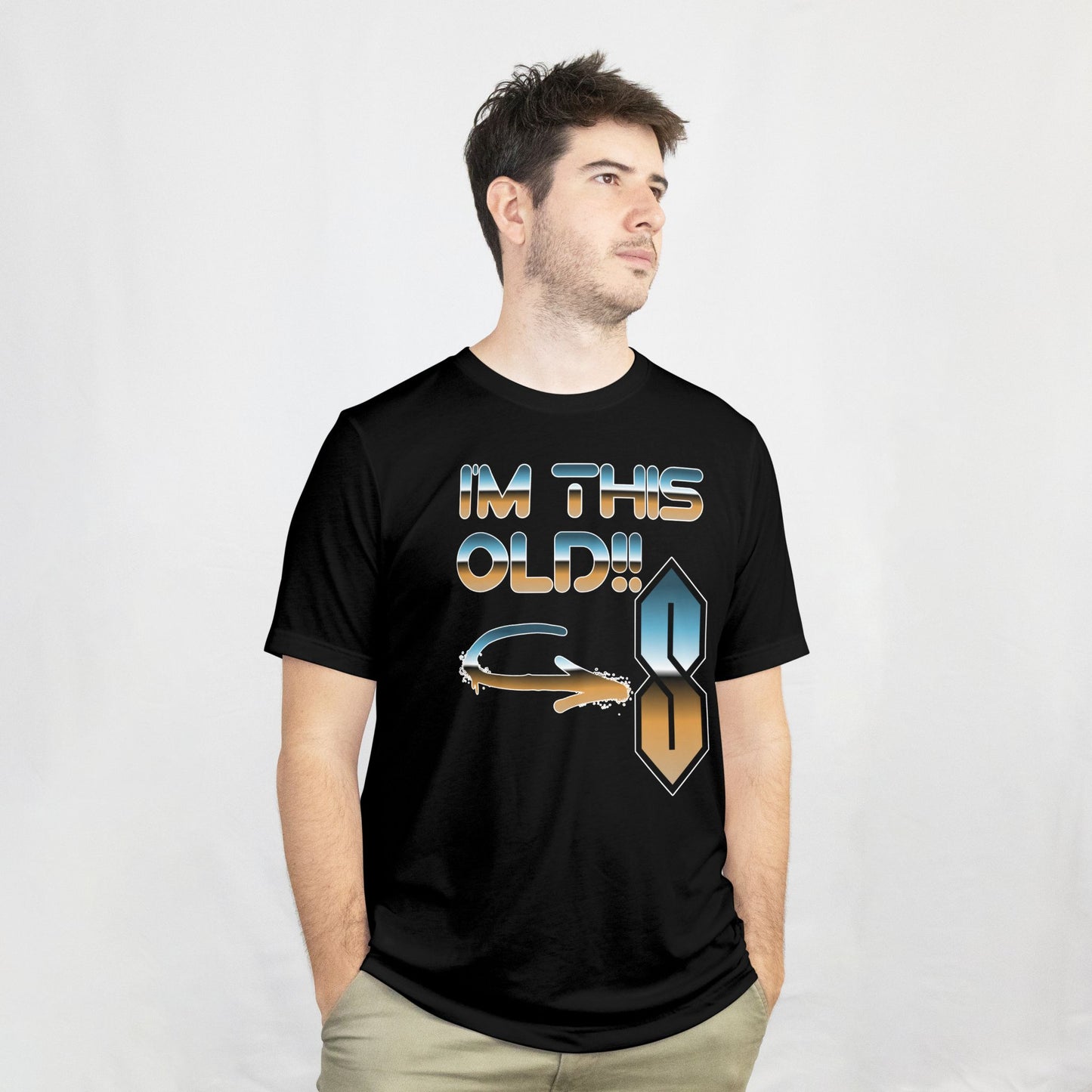 Man wearing a black t-shirt with 'I'm this old!' text and graphic design on a white background
